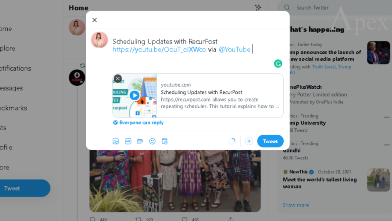 User composing a tweet with a YouTube link preview.