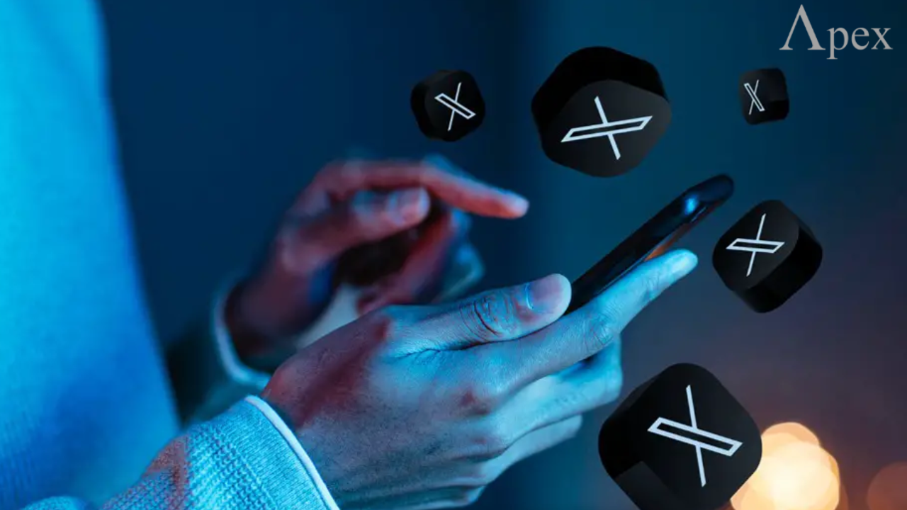 Close-up of hands holding a smartphone with floating X logos, representing the X (Twitter) app.